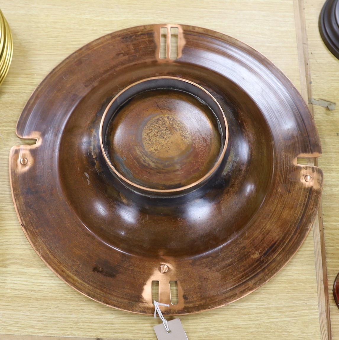 Sam Fanaroff - A large copper dish on stand, (Sussex Guild, West Ham, Pevensey), 45 cms diameter